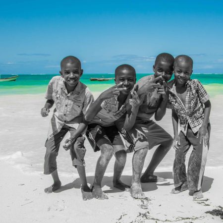 Boys_playing_on_a_Zanzibar_beach